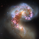 Illustration for article titled Hubble captures the most detailed image of two galaxies colliding